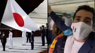 Vestido con el traje de gala color azul con detalles bordas de Oaxaca