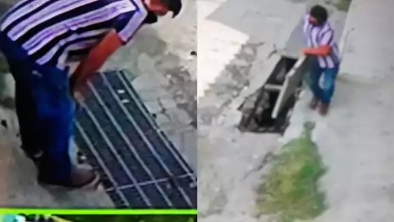 El hombre se llevó la alcantarilla sin percatarse que era captado por una cámara de videovigilancia El hombre se llevó la alcantarilla sin percatarse que era captado por una cámara de videovigilancia
