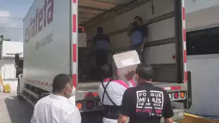Los paquetes arribaron esta tarde en camiones al INE Chetumal