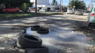 Cancún, de paraíso caribeño a destino lleno de baches y basura