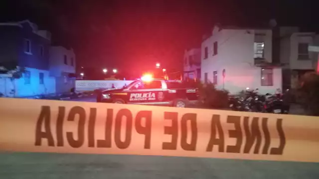 Los elementos de la Policía Quintana Roo acordonaron la zona del asesinato en el fraccionamiento Villas Otoch Paraíso de Cancún