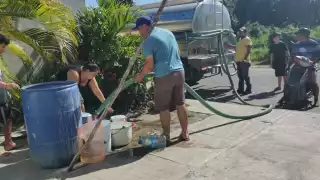 Vecinos de Puerto Aventuras amenazan con bloquear carretera federal si Aguakan no los atiende