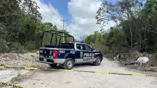 Un cuerpo descuartizado fue dejado dentro de una bolsa en un camino de terracería