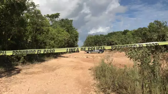 Las autoridades policiacas acordonaron la zona del hallazgo del cuerpo en el fraccionamiento Prado Norte de Cancún Las autoridades policiacas acordonaron la zona del hallazgo del cuerpo en el fraccionamiento Prado Norte de Cancún