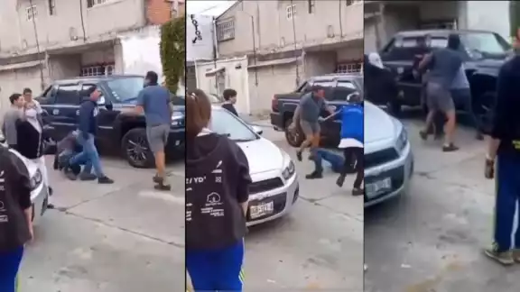 Captan fuerte pelea entre padres de familia y alumnos de colegio en Puebla Captan fuerte pelea entre padres de familia y alumnos de colegio en Puebla