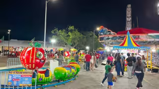 ¿Cuánto cuesta ir a la Feria de San Román de Campeche 2026? Esto gastarías en juegos, comida y transporte