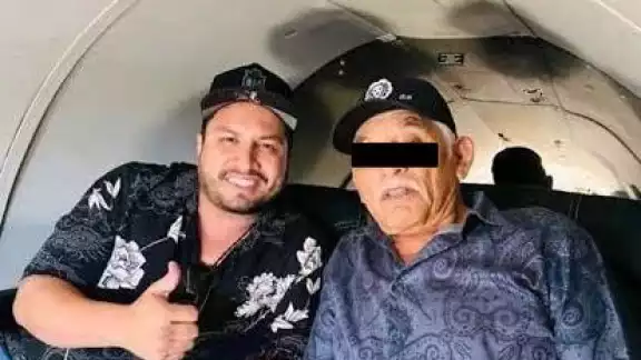 Julión junto a su padre