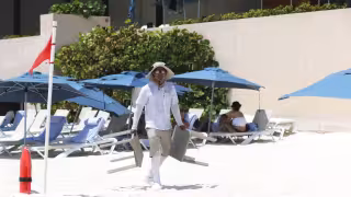 Entre bajos salarios y altos costos: Trabajadores hoteleros de Cancún muestran satisfacción laboral