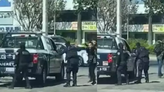 El sujeto armado arremetió varias veces contra los policías. Foto: Captura de Pantalla El sujeto armado arremetió varias veces contra los policías. Foto: Captura de Pantalla