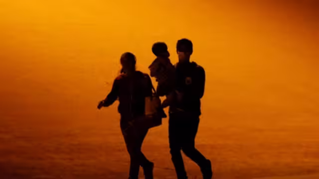 Migrantes en el cruce fronterizo de Ciudad Juárez y El Paso