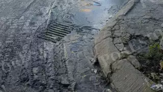 Vecinos de Barrio Maya en Cancún denuncian calles enlodadas tras trabajos de limpieza de cañería