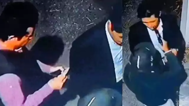 Un hombre amaga con una pistola a la víctima. Foto: Especial