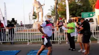 Desde muy temprano, comenzaron a reunirse los corredores, iniciando con la aplicación de los protocolos sanitarios