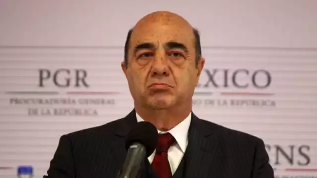 Vinculan a proceso a Murillo Karam por tortura y desaparición forzada en caso Ayotzinapa