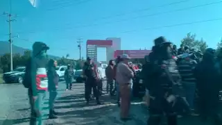 Sujetos encapuchados portaban armas de fuego y vestían con uniforme tipo militar
