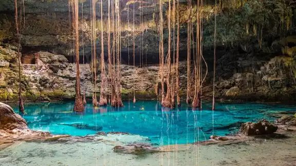 Grupo Xcaret perforó cenotes para crear ríos subterráneos al interior del parque Xibalbá