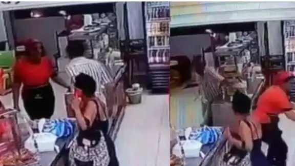 El delincuente intentó llevarse todo el dinero. Foto: Captura de pantalla. El delincuente intentó llevarse todo el dinero. Foto: Captura de pantalla.