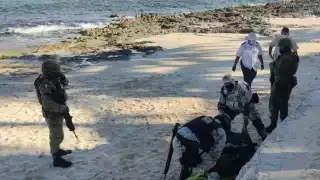 Fue frente a un hotel de Puerto Morelos donde se dio el hallazgo de los paquetes de marihuana en la playa
