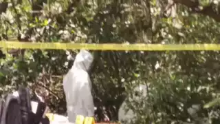 Elementos de la unidad forense llegaron al lugar para levantar los cuerpos