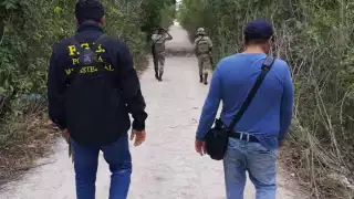 Hallan restos humanos de dos víctimas en fosa clandestina en Cancún