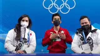 Donovan Carrillo junto a sus entrenadores en espera de su puntuación. Foto: Captura de pantalla