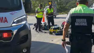 Elementos de la Guardia Nacional llegaron a la escena para abanderar.