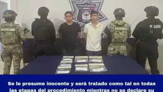 Elementos policiacos y de la Marina aseguraron a los dos sujetos.