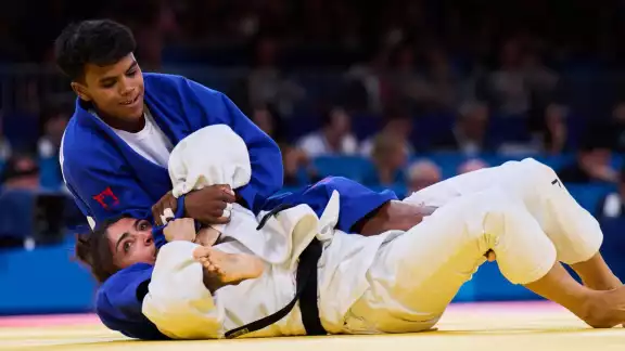 La judoca mexicana en acción en su primer duelo La judoca mexicana en acción en su primer duelo