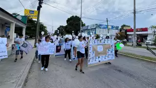 Colectivo de búsqueda marcha en Felipe Carrillo Puerto por el Día Internacional de las Personas Desaparecidas 