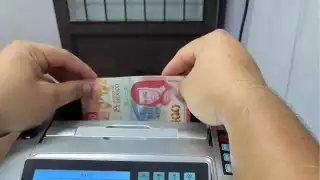 Comerciantes y taxistas de Huhí toman medidas estrictas tras detectar la circulación de billetes falsos