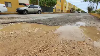 Debido al mal trabajo, las lluvias abrieron nuevamente los baches