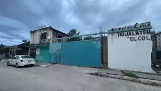 Elementos de la FGR catean taller mecánico que fue baleado en  Playa del Carmen