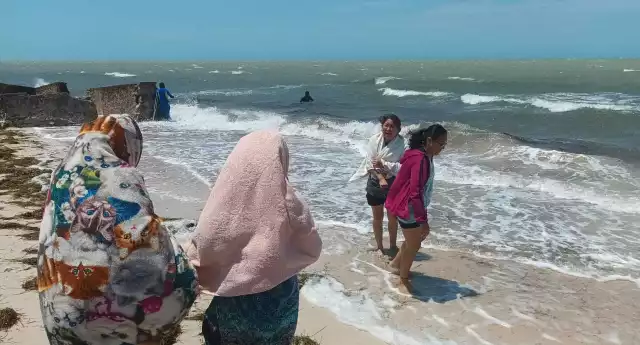 La llegada de frentes fríos afecta directamente la economía de los trabajadores del malecón