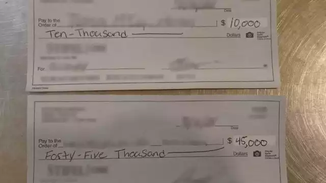 Detienen a extranjera en Cancún por 65 mil dólares en cheques sin declarar