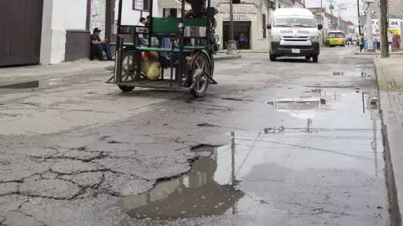 La cifra de llamadas de ciudadanos para denunciar hoyancos se triplicó con los chubascos recientes