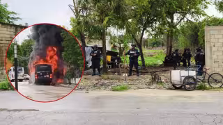 Invasores prenden fuego a un camión policial durante diligencia de desalojo en Playa del Carmen