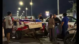 Hallan a gemelos en una maleta tras confuso accidente en Veracruz; estaban deshidratados