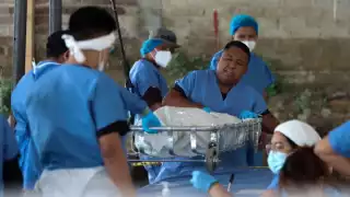 Hallan más de 60 cuerpos, incluidos 10 bebés, en fosas clandestinas de Tetelcingo; suspenden exhumaciones por riesgo estructural