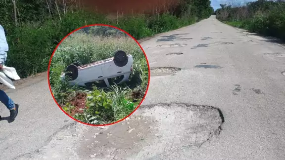 Automóvil vuelca en tramo Hopelchén-Komchén al esquivar baches; exigen reparación urgente Automóvil vuelca en tramo Hopelchén-Komchén al esquivar baches; exigen reparación urgente