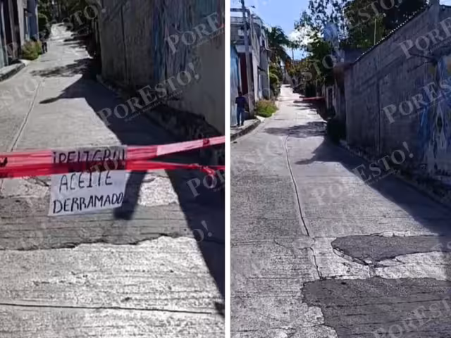 Andador cerrado por riesgo vial frente a letrero de advertencia