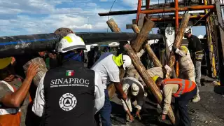 Recuperan restos humanos del sexto minero en El Pinabete