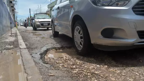 Por ley, el Ayuntamiento debe pagar los daños causados por el mal estado de las calles