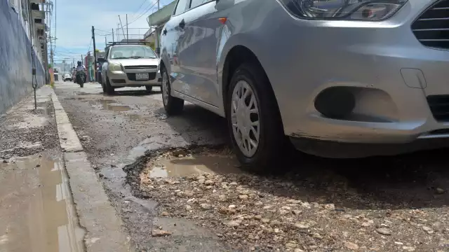 Por ley, el Ayuntamiento debe pagar los daños causados por el mal estado de las calles