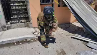 Nuevo enfrentamiento en la colonia 23 de Julio en Carmen: Incendian vivienda y rescatan a 10 perros 