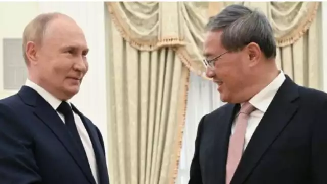 Vladimir Putin, presidente de Rusia y Li Qiang, primer ministro de China