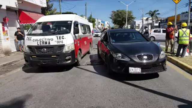 Choque entre vehículos en López Mateos provoca confrontación y largas filas de autos