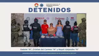 Capturan a supuesta líder de grupo delictivo y otras dos personas en Cancún
