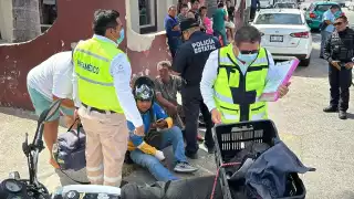 Motociclista e indigente heridos tras choque en el barrio de Guadalupe