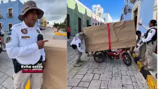  En Campeche, policías envuelven motos mal estacionadas como regalo para crear conciencia