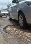 Por ley, el Ayuntamiento debe pagar los daños causados por el mal estado de las calles